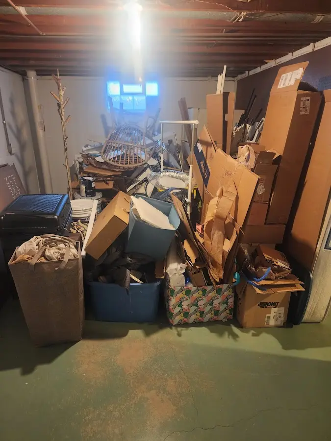 Roll-off dumpster container at job site for Concrete Dumpster Rental in Camanche